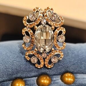 Vintage Victorian look costume jewelery. Coral pink accent stones.